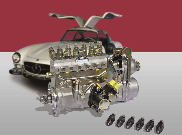 Sim Motoren, Schweiz - Fahrzeug und Pumpe im Vordergrund